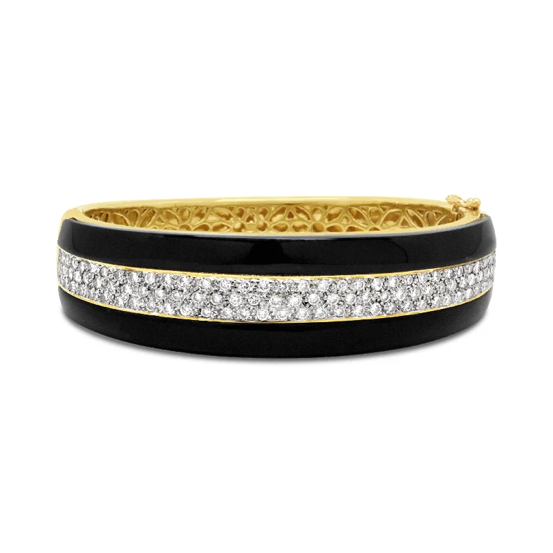 18KT GOLD VINTAGE ONYX & DIAMOND BANGLE.